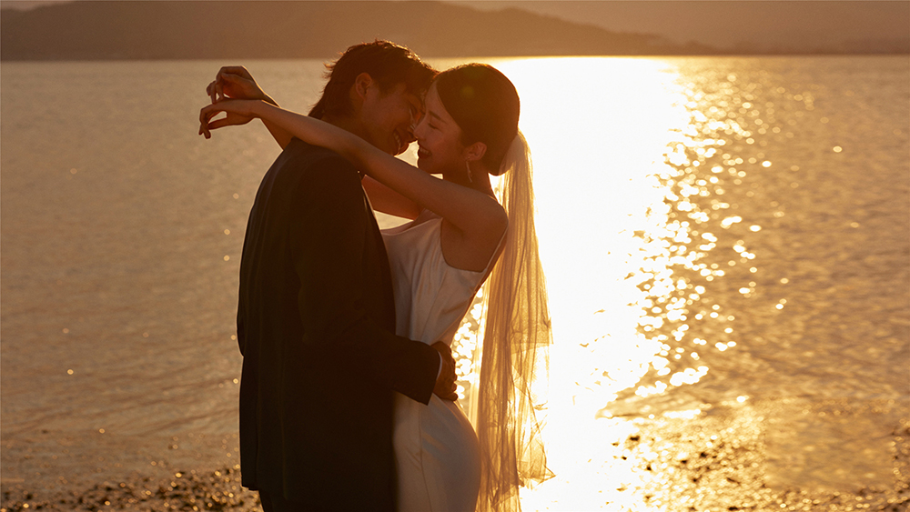 秦先生&范小姐夫妇深圳海景夕阳婚纱照